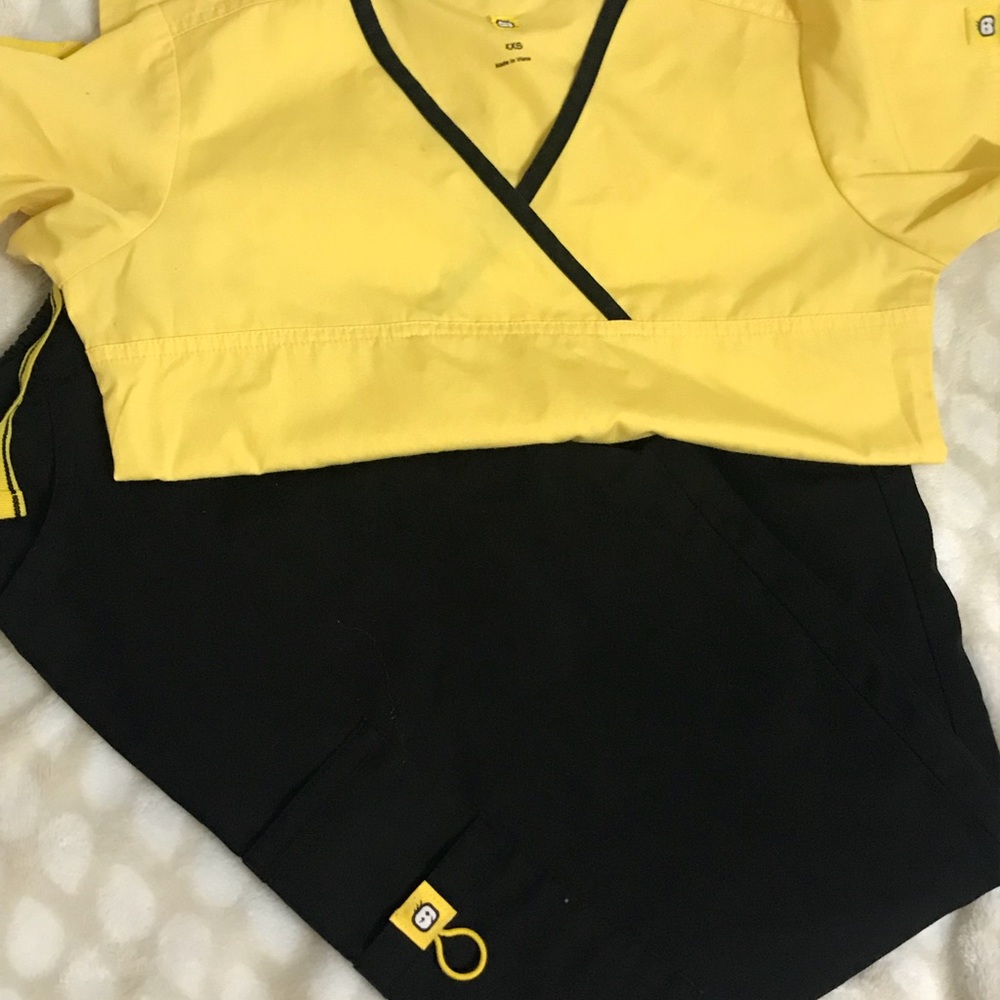 Black and yellow scrubs